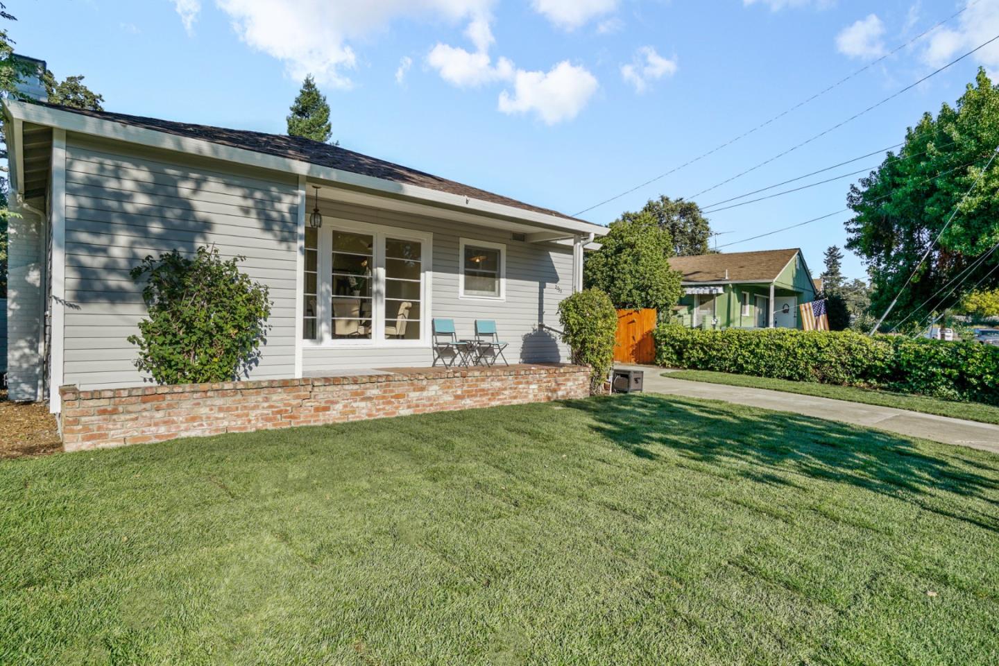 3755 Bay Road Menlo Park, CA 94025 - Photo 2 of 29 a front view of a house with garden