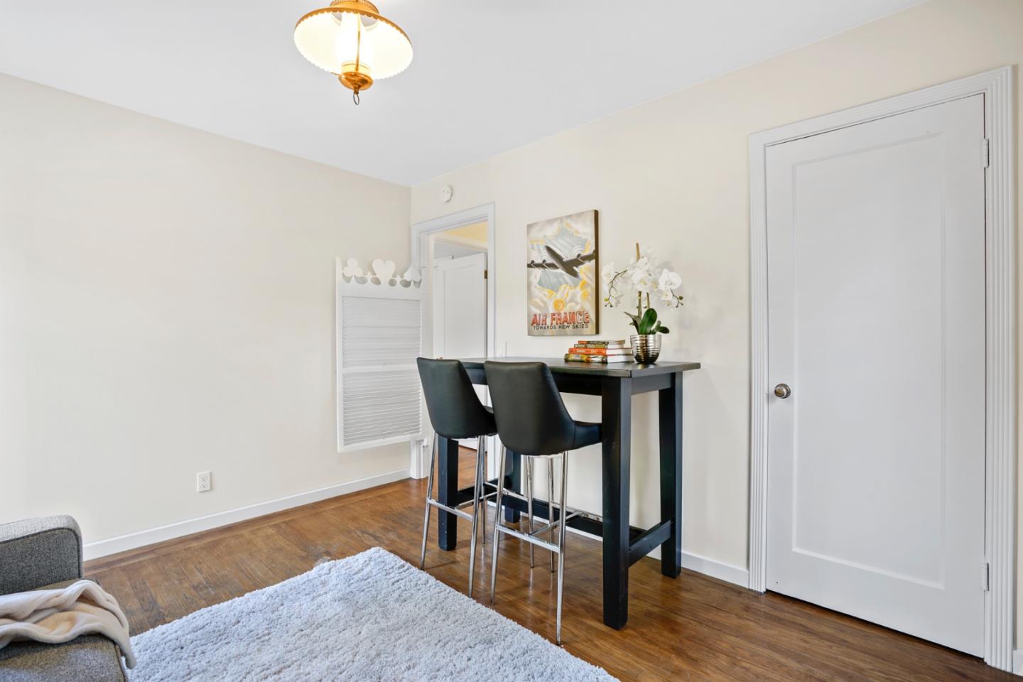 3755 Bay Road Menlo Park, CA 94025 - Photo 22 of 29 a view of a dining room with furniture and wooden floor