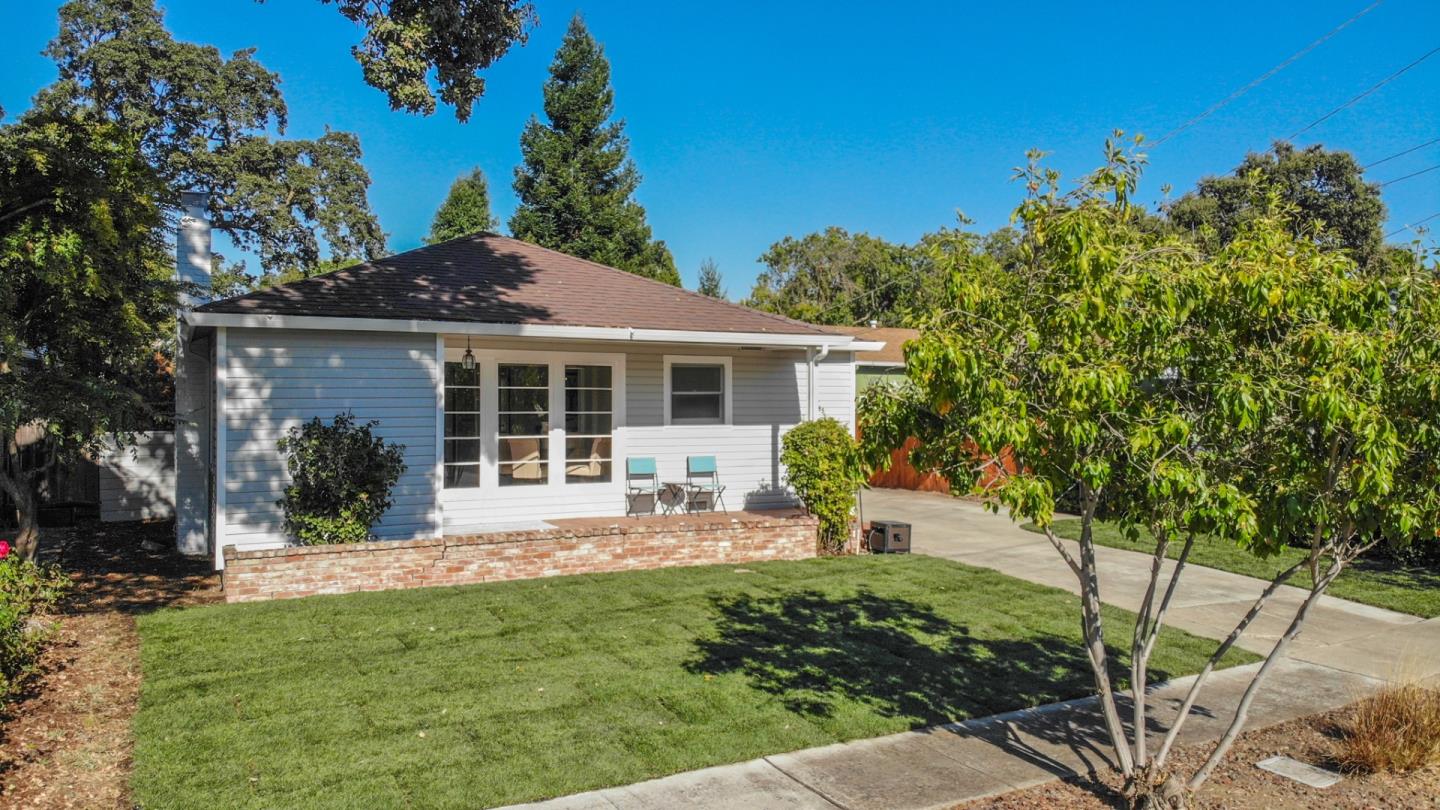3755 Bay Road Menlo Park, CA 94025 - Photo 29 of 29 a front view of a house with a yard and potted plants
