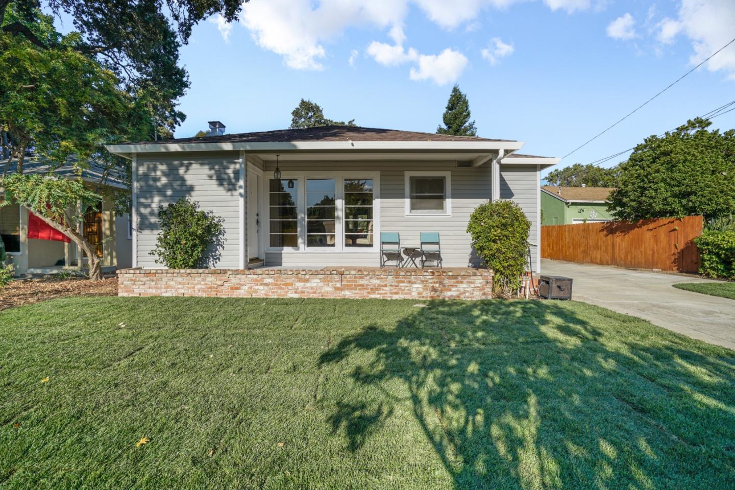 3755 Bay Road Menlo Park, CA 94025 - Photo 3 of 29 a view of a house with a backyard and a tree