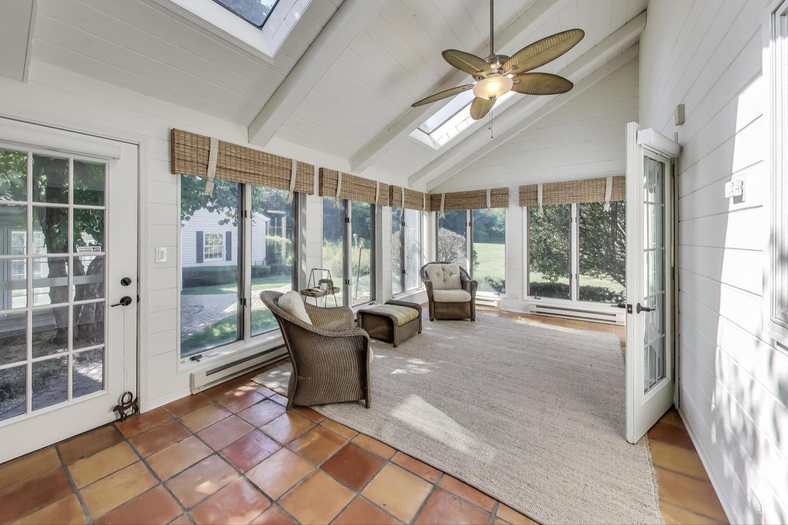924 Stonefield Circle Inverness, IL 60067 - Photo 13 of 50 a living room with furniture and large windows