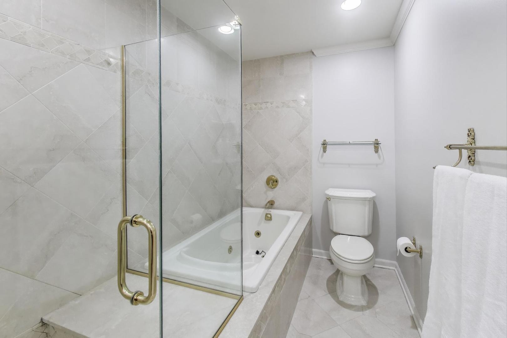924 Stonefield Circle Inverness, IL 60067 - Photo 27 of 50 a bathroom with a toilet and a shower