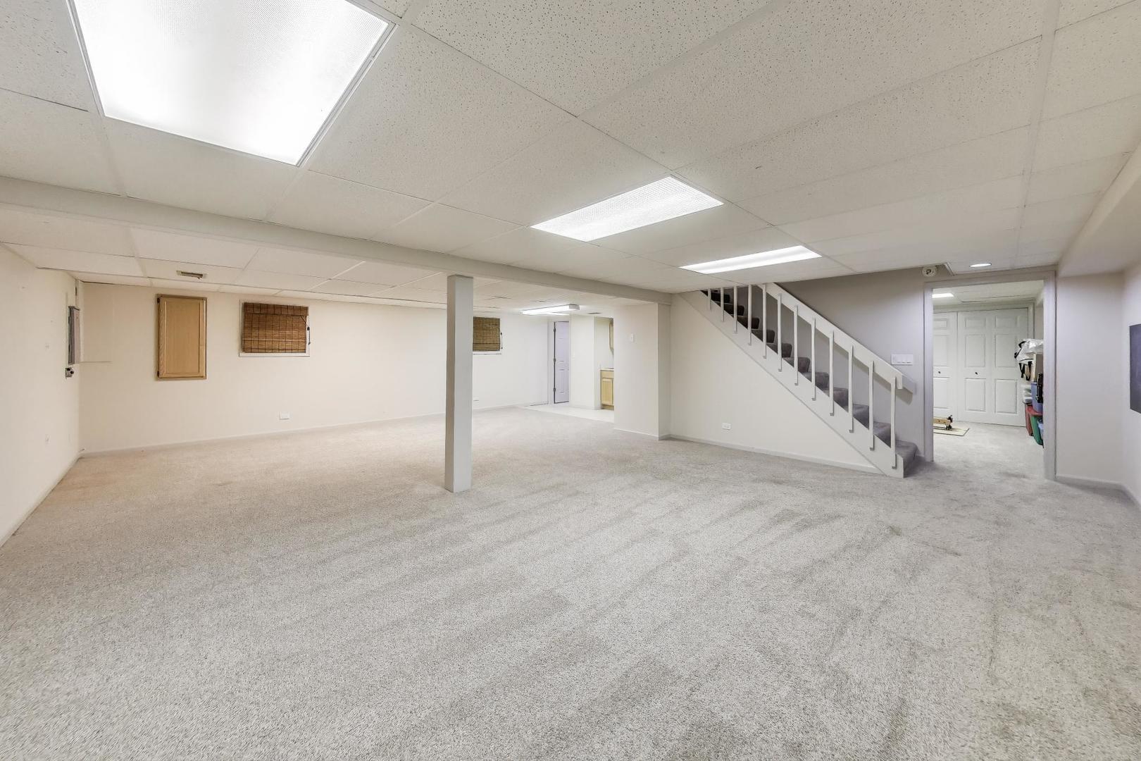 924 Stonefield Circle Inverness, IL 60067 - Photo 34 of 50 a view of an empty room with stairs