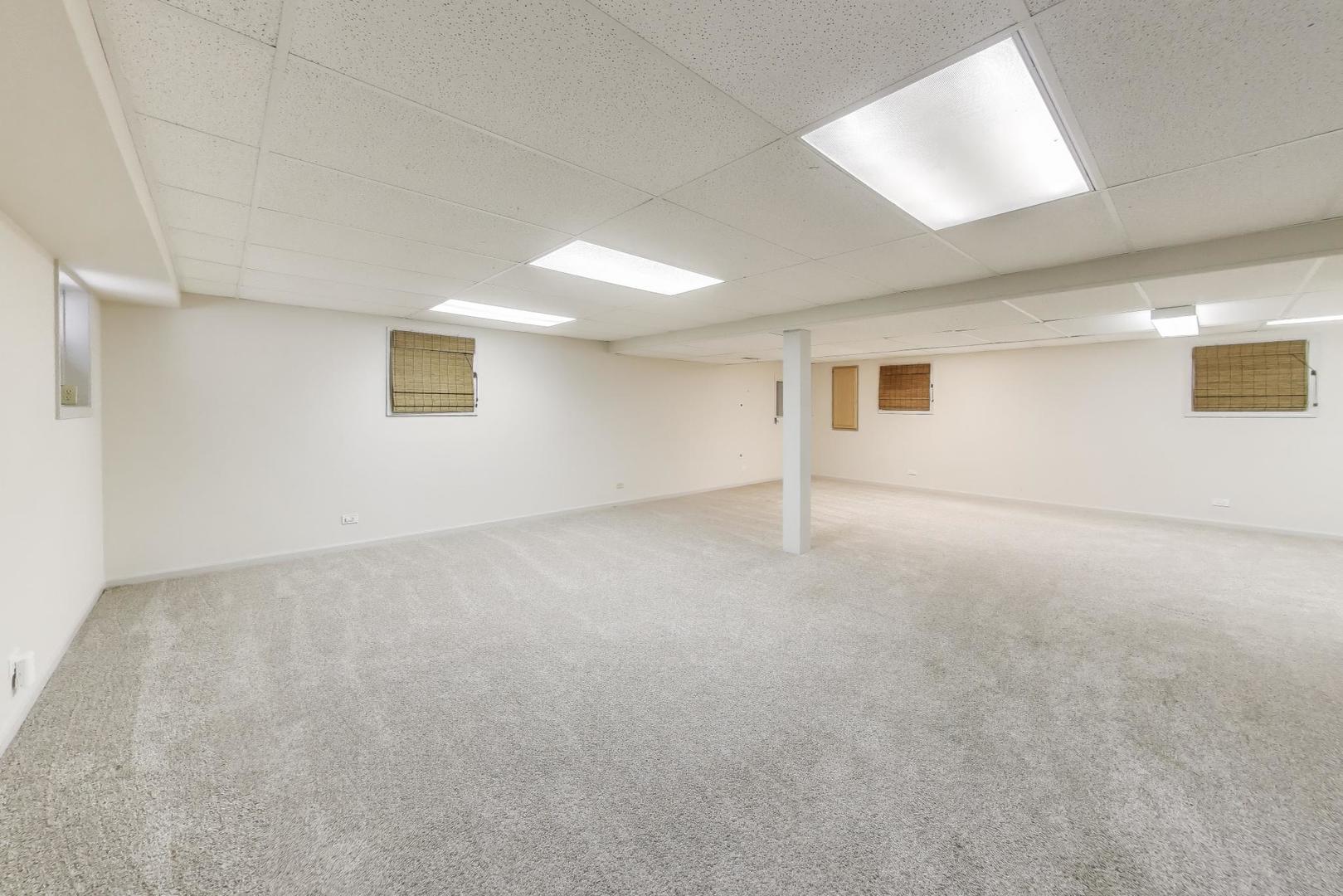 924 Stonefield Circle Inverness, IL 60067 - Photo 35 of 50 a view of an empty room with a window