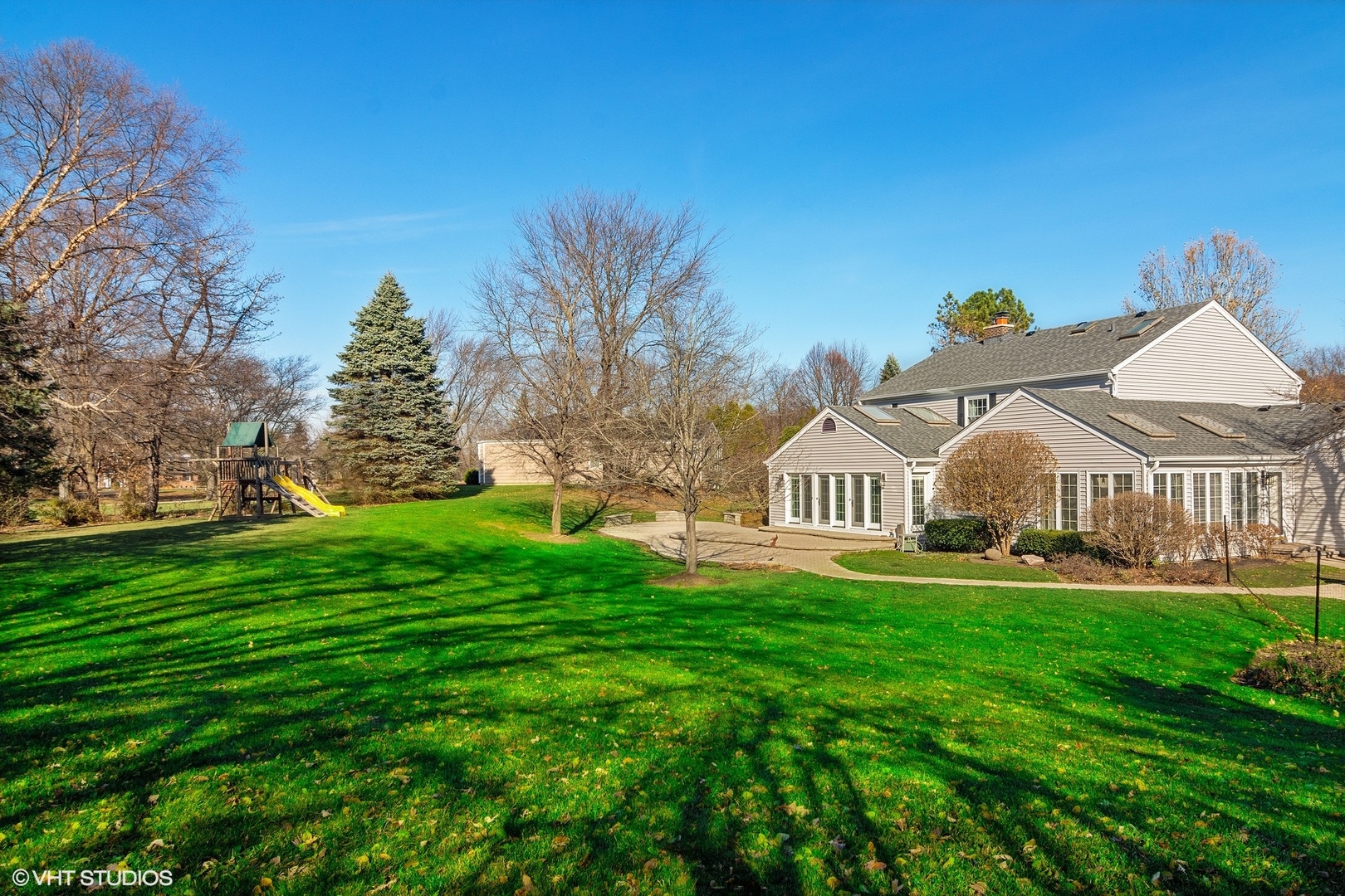 924 Stonefield Circle Inverness, IL 60067 - Photo 50 of 50 a front view of a house with a yard and trees