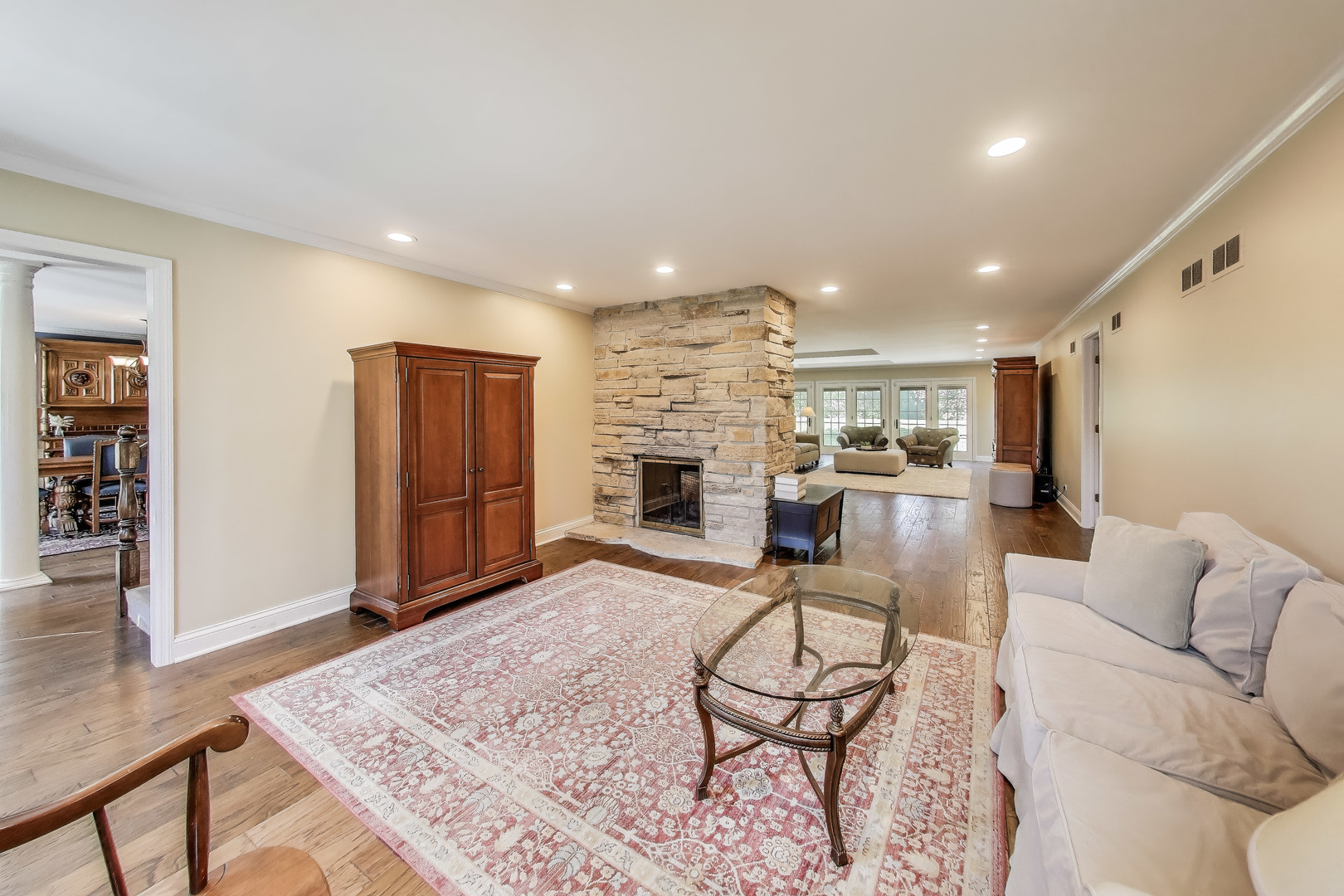 924 Stonefield Circle Inverness, IL 60067 - Photo 5 of 50 a view of a livingroom with furniture and a fireplace