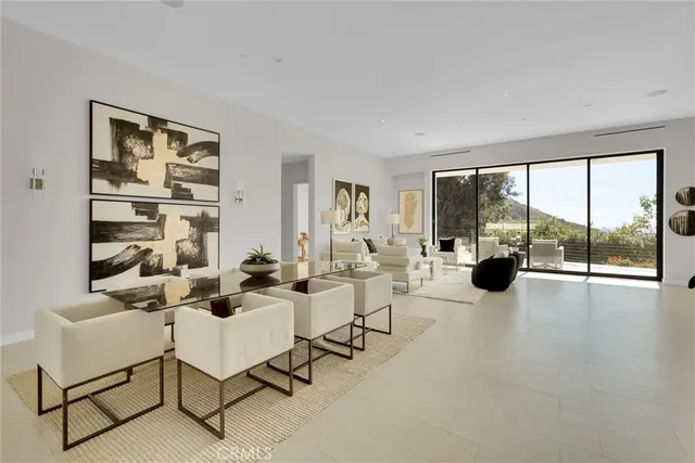 a kitchen with stainless steel appliances a stove sink and cabinets
