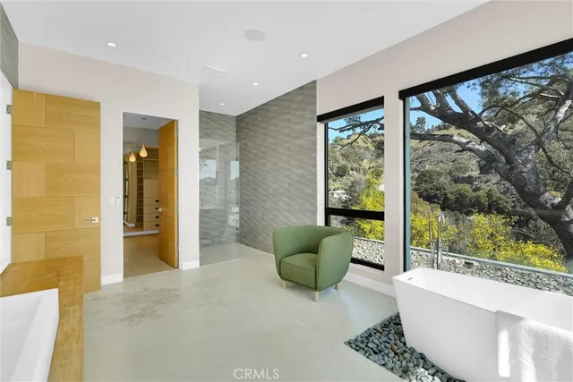 a view of a backyard with a table and chairs