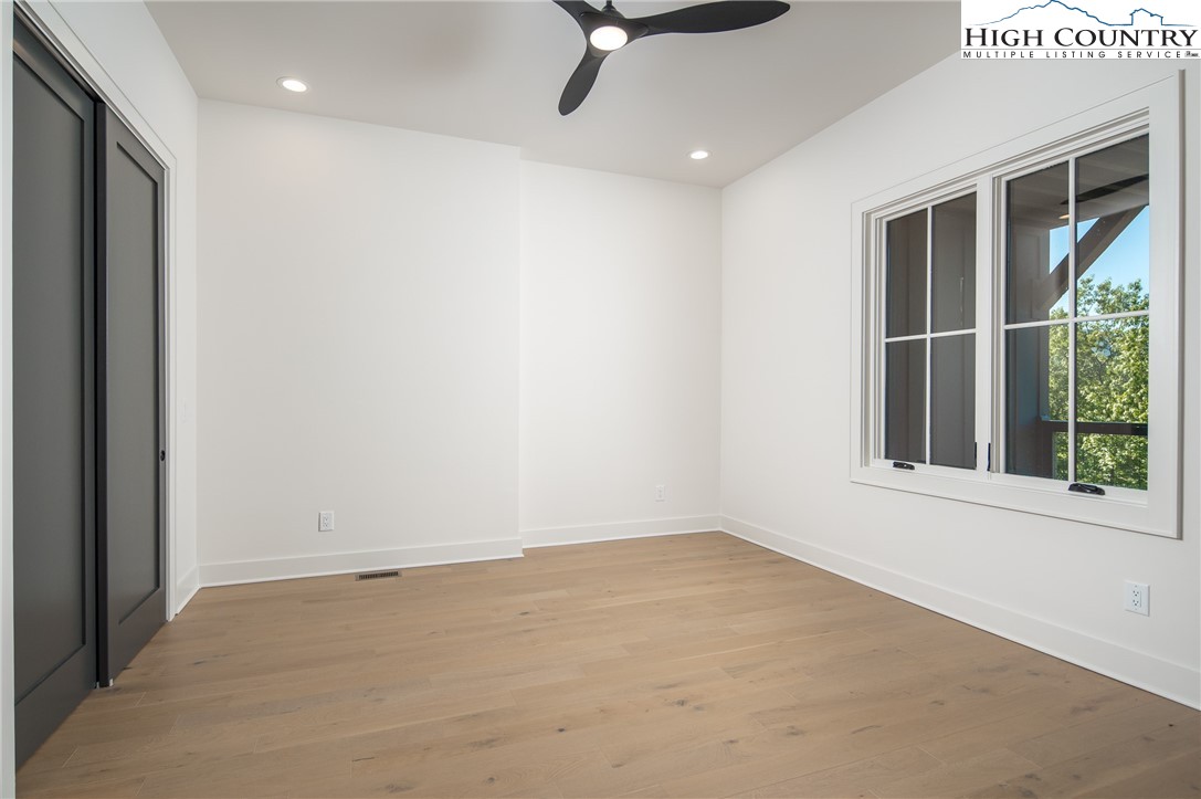 359 Calico Court Boone, NC 28607 - Photo 20 of 50 a view of a livingroom with a ceiling fan and window