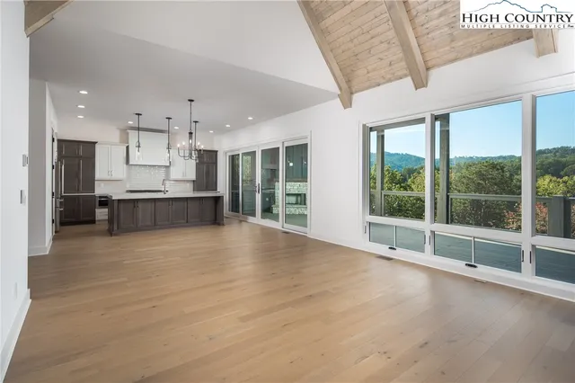 a view of large kitchen with large windows