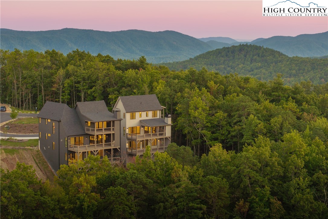 359 Calico Court Boone, NC 28607 - Photo 37 of 50 a view of a town with mountains in the background