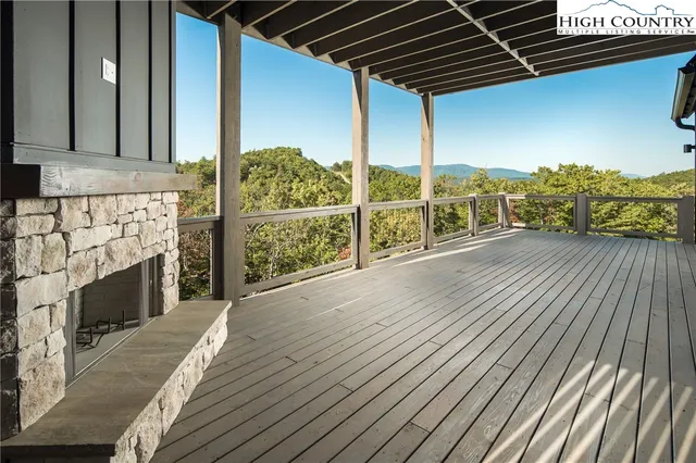 a view of balcony with furniture