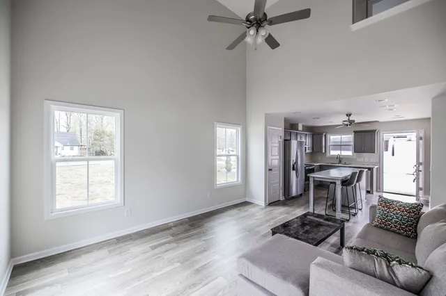 a living room with furniture and a window