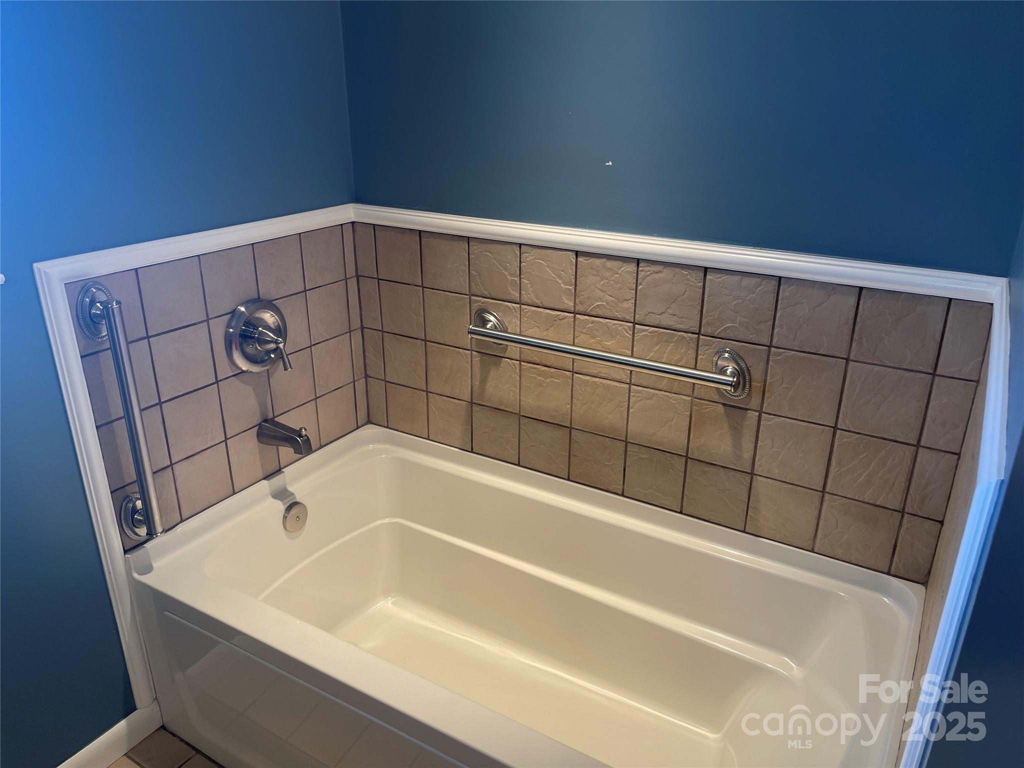 14701 Beckenham Drive Charlotte, NC 28227 - Photo 12 of 19 a bathroom with a bathtub