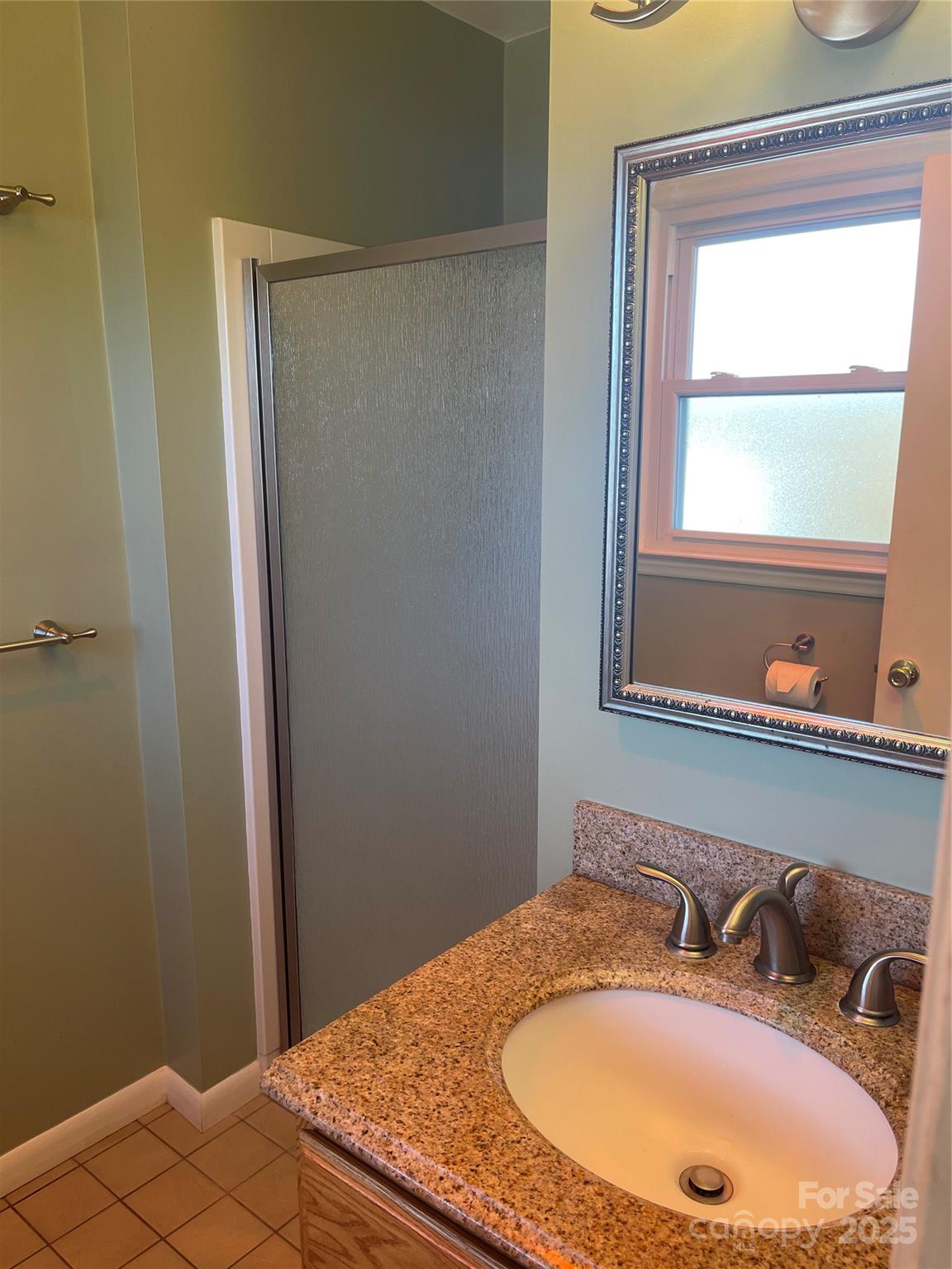 14701 Beckenham Drive Charlotte, NC 28227 - Photo 17 of 19 a bathroom with a sink and a mirror