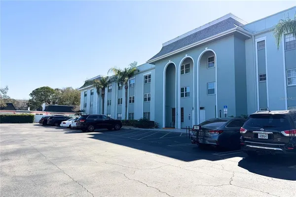 a car parked in front of a house