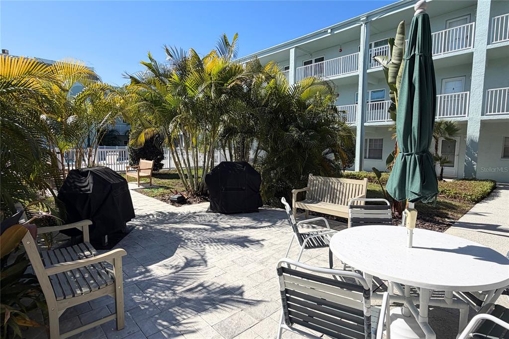 701 Poinsettia Road, Unit 340 Belleair, FL 33756 - Photo 19 of 24 a view of outdoor space yard and patio