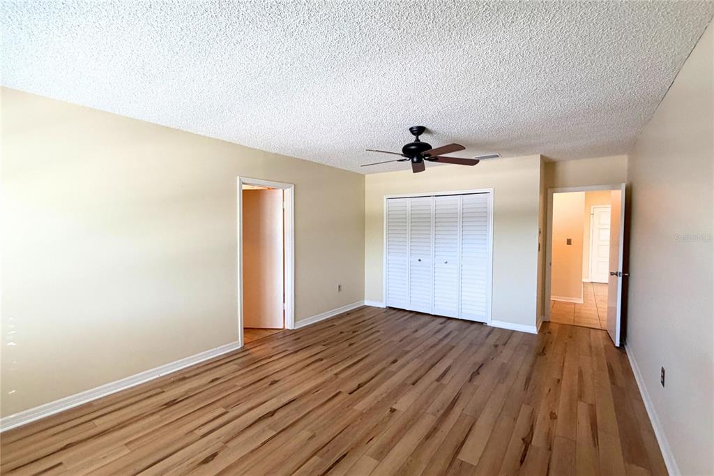 701 Poinsettia Road, Unit 340 Belleair, FL 33756 - Photo 10 of 24 a view of a livingroom with wooden floor