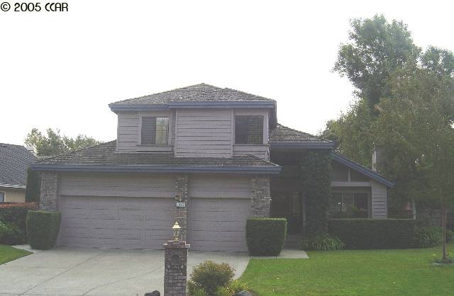 1167 Canyon Hills Road San Ramon, CA 94582 - Photo 1 of 1 a front view of a house with a garden