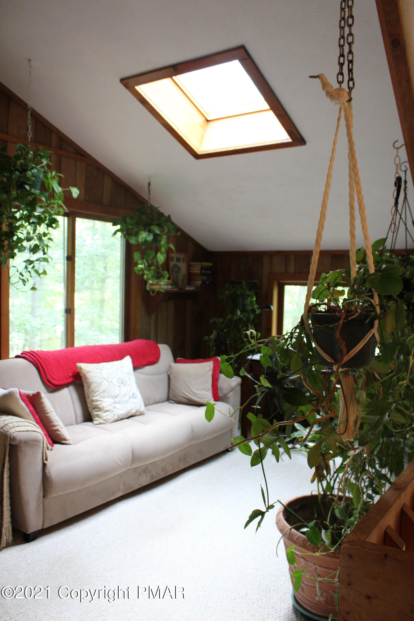 4208 Winchester Way Bushkill, PA 18324 - Photo 19 of 44 a living room with furniture and a potted plant