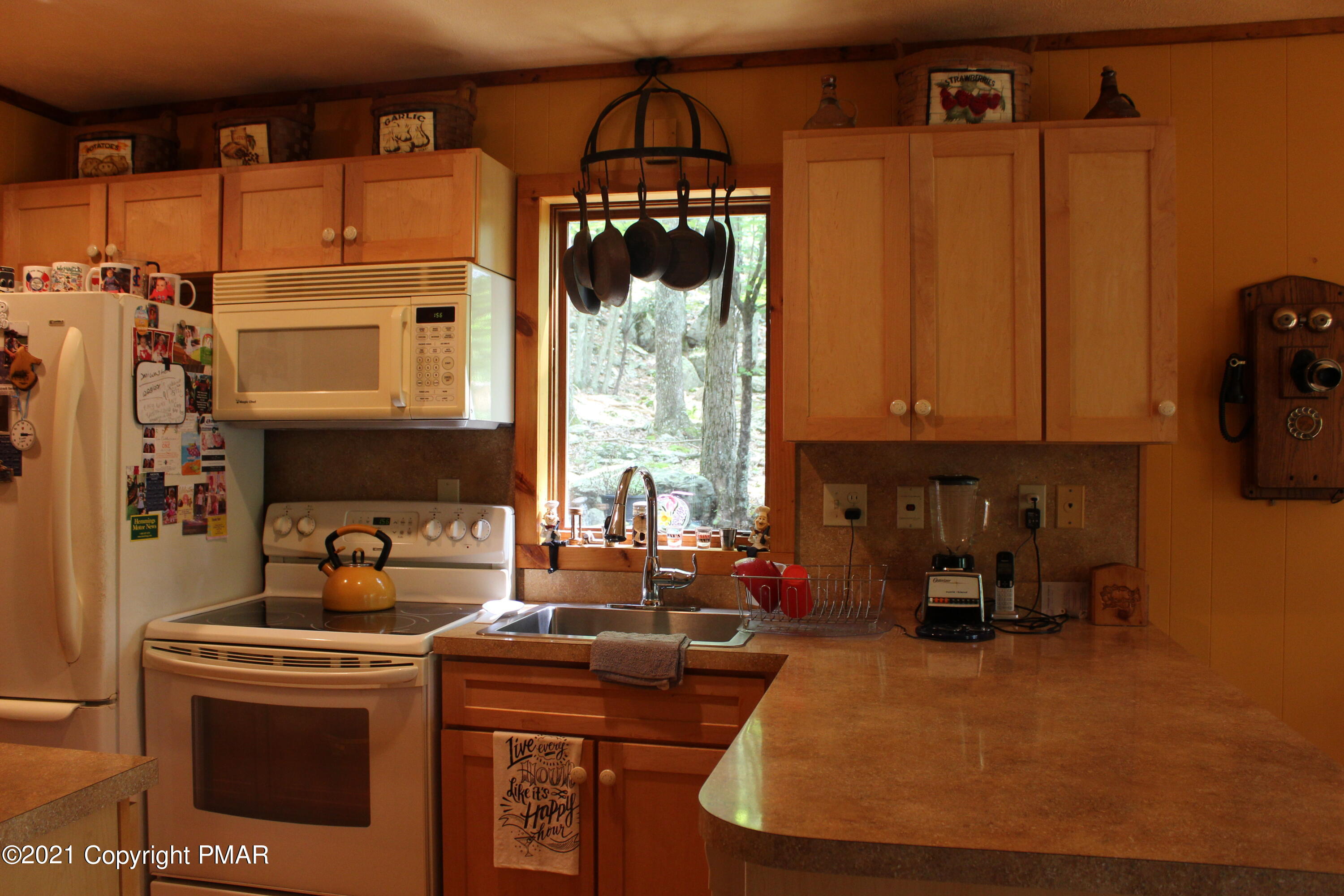 4208 Winchester Way Bushkill, PA 18324 - Photo 2 of 44 a kitchen with a sink cabinets and appliances