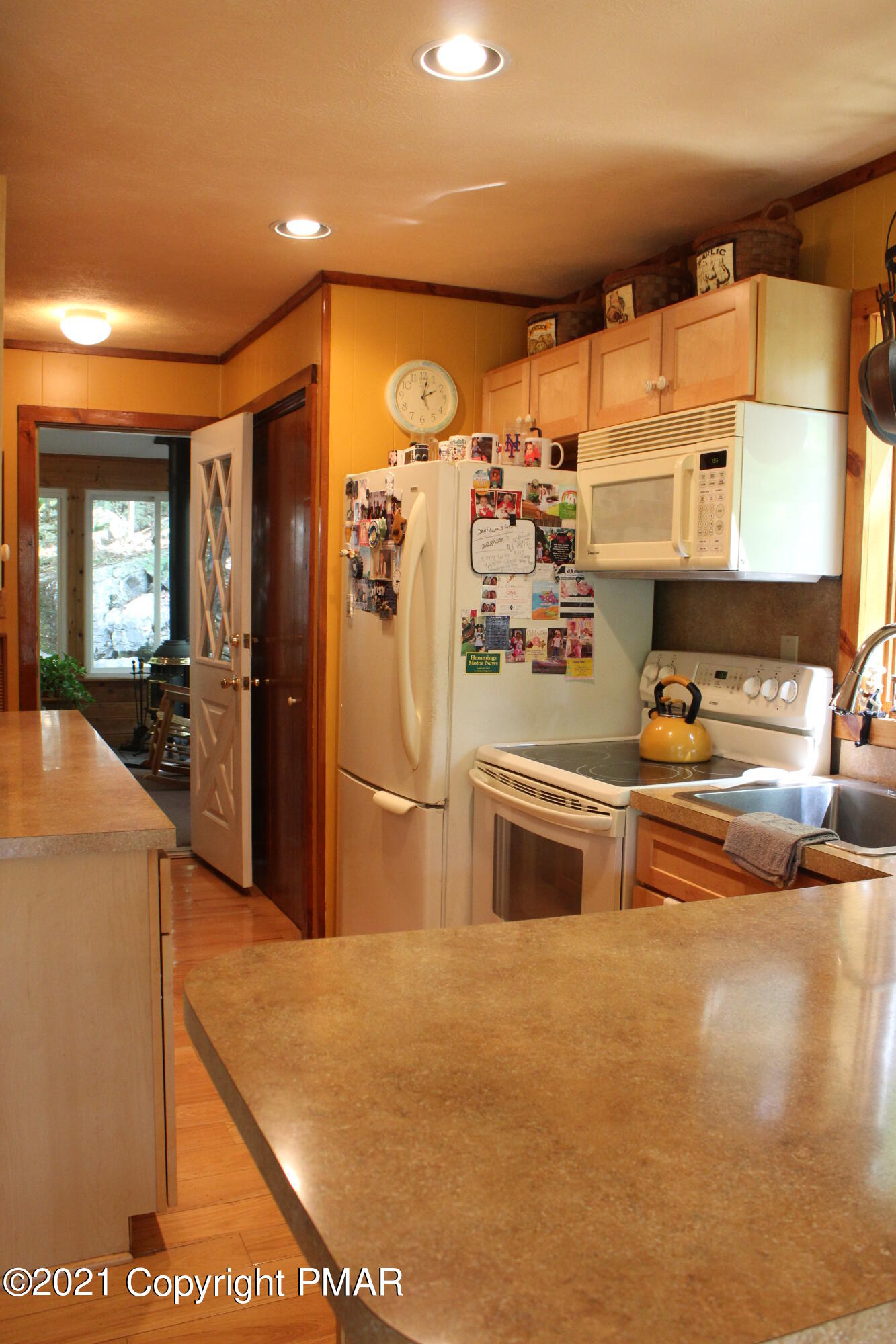 4208 Winchester Way Bushkill, PA 18324 - Photo 3 of 44 a kitchen with stainless steel appliances granite countertop a refrigerator and a stove