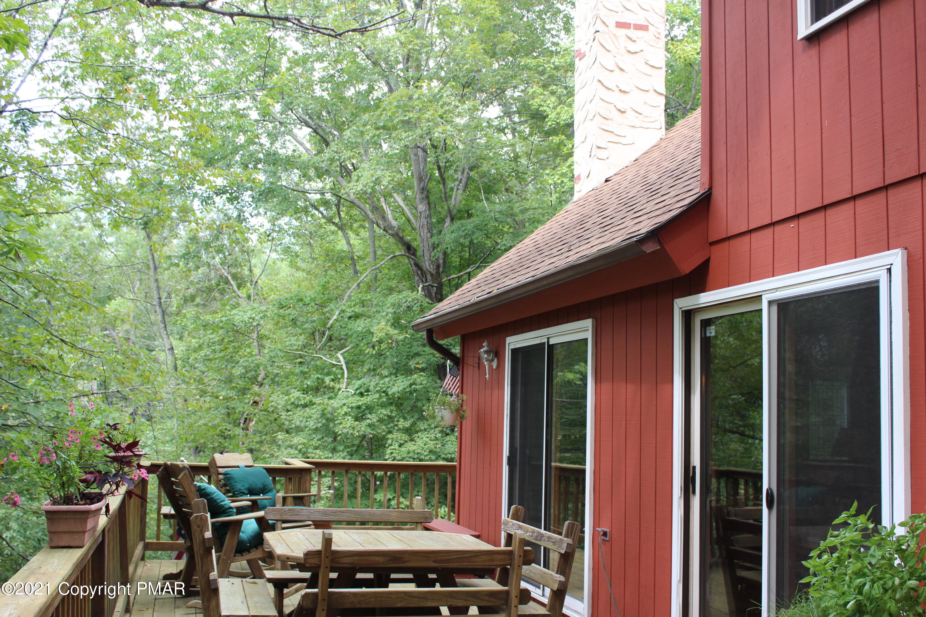 4208 Winchester Way Bushkill, PA 18324 - Photo 43 of 44 a view of house with backyard space and garden