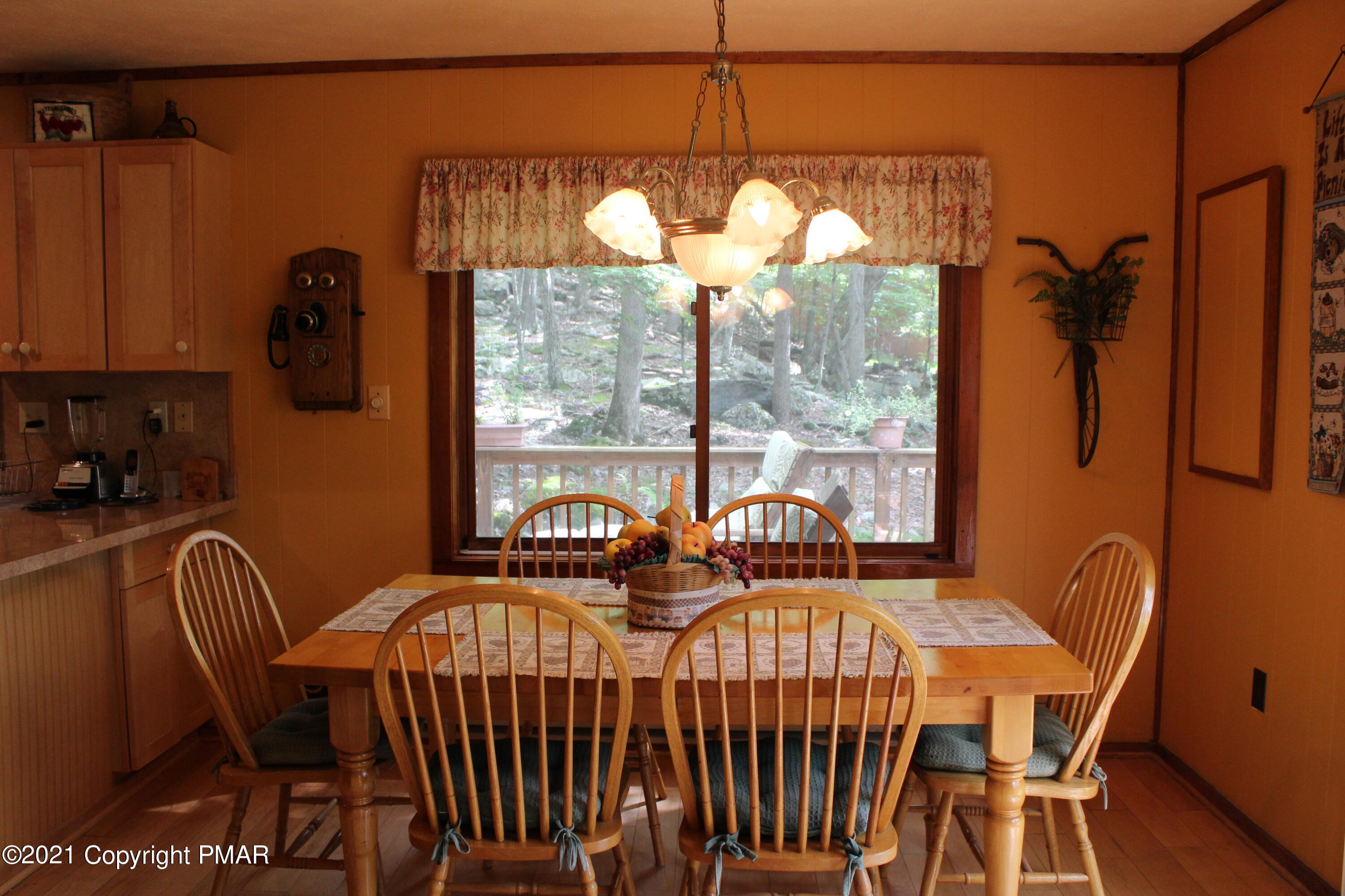 4208 Winchester Way Bushkill, PA 18324 - Photo 6 of 44 a view of a dining room with furniture window and outside view