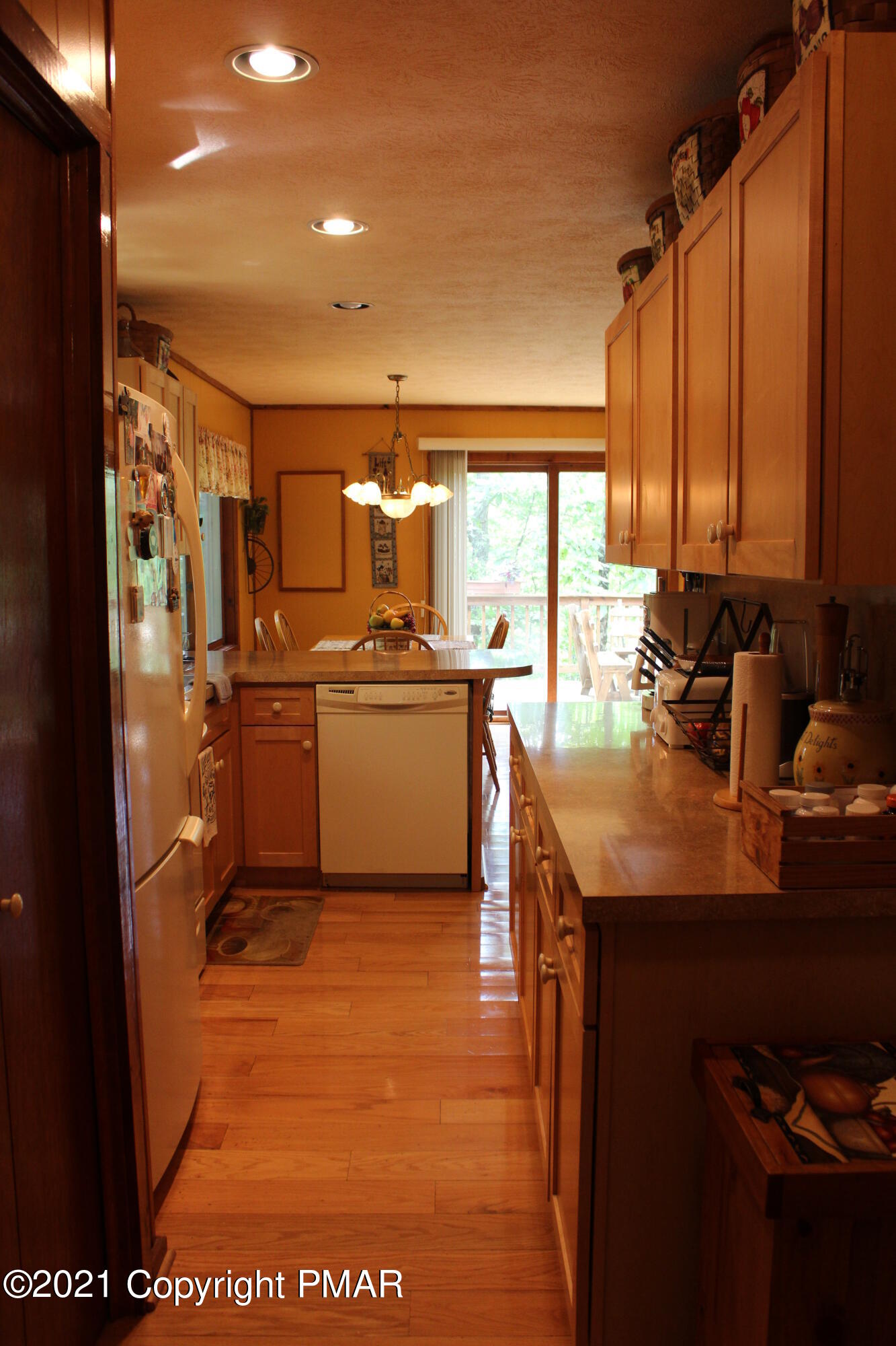 4208 Winchester Way Bushkill, PA 18324 - Photo 7 of 44 a kitchen with a sink cabinets and appliances