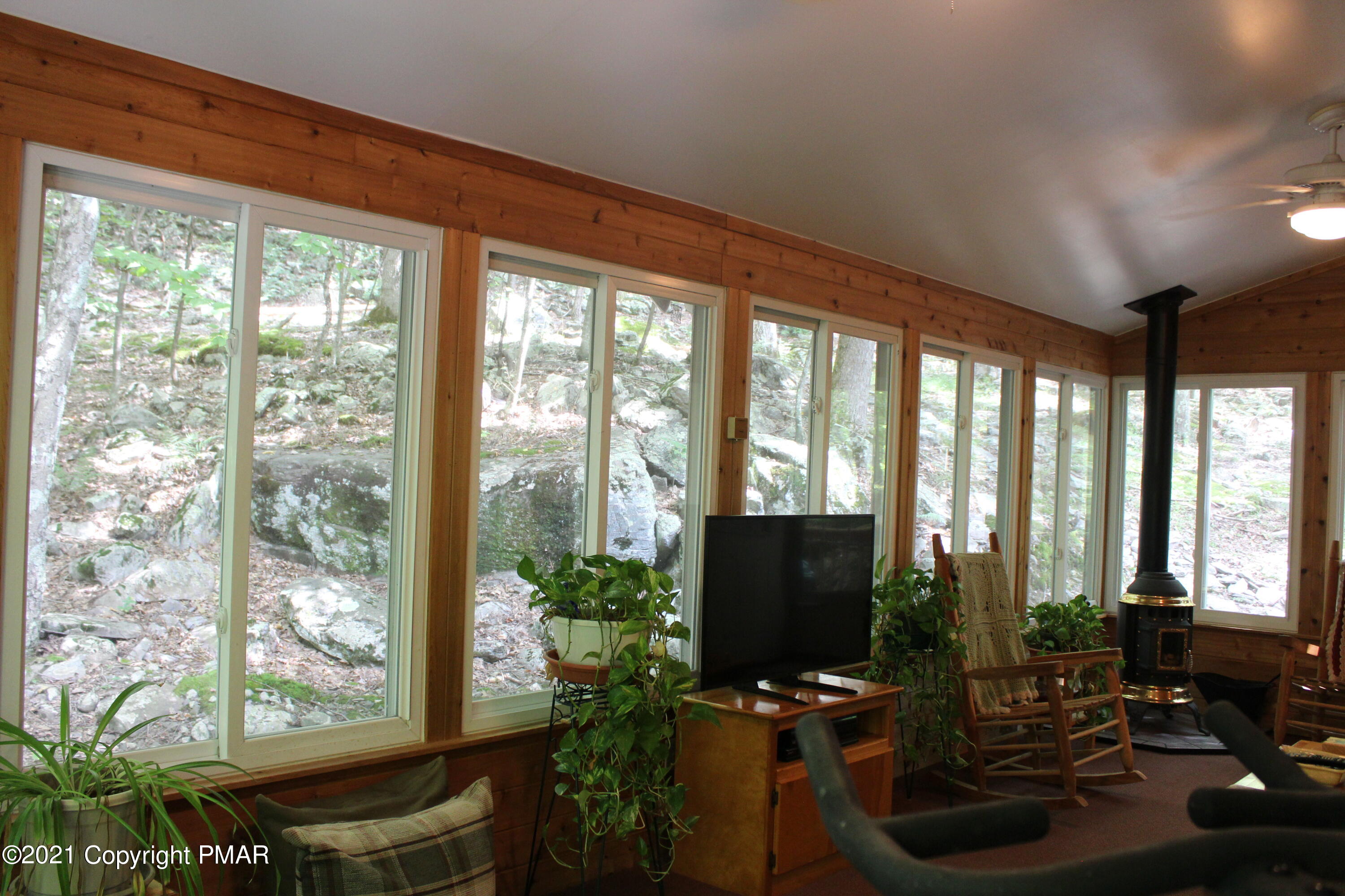4208 Winchester Way Bushkill, PA 18324 - Photo 10 of 44 a room with furniture and a potted plant