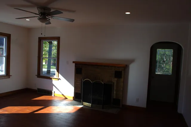 a view of an entryway with a fireplace