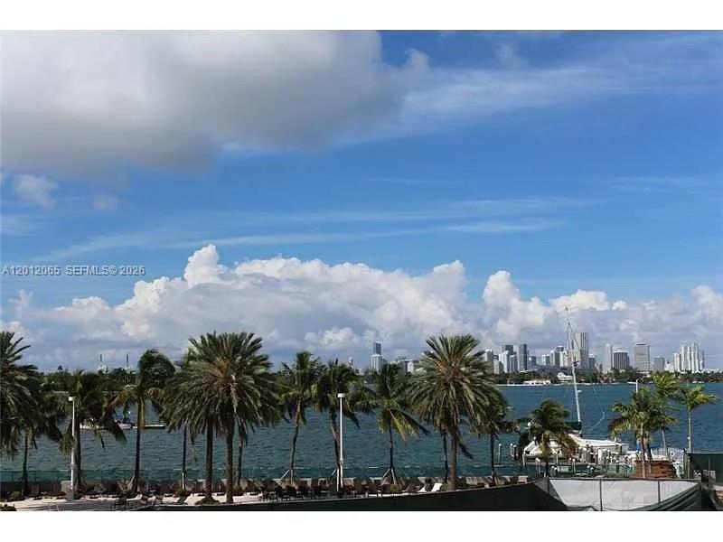 1500 Bay Road, Unit 318S Miami Beach, FL 33139 - Photo 1 of 6 a view of a city with a building in background