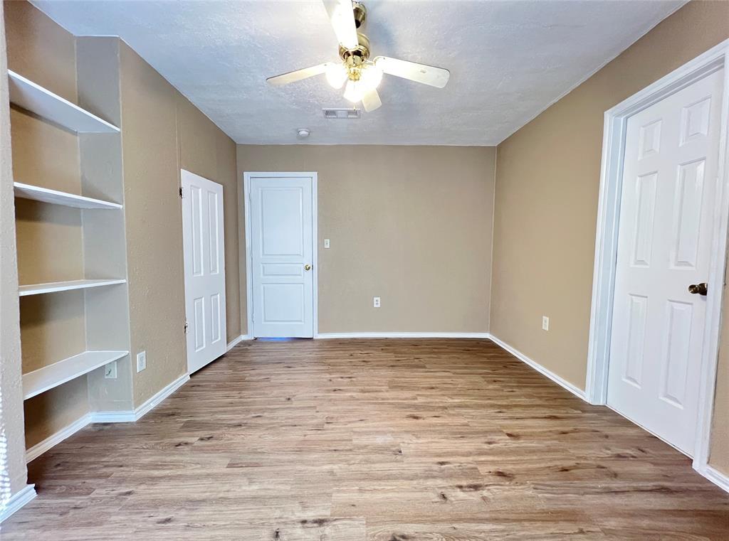 503 Pierce Street Denton, TX 76201 - Photo 7 of 12 a view of an empty room with a window