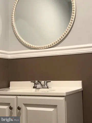 a bathroom with a toilet and a sink