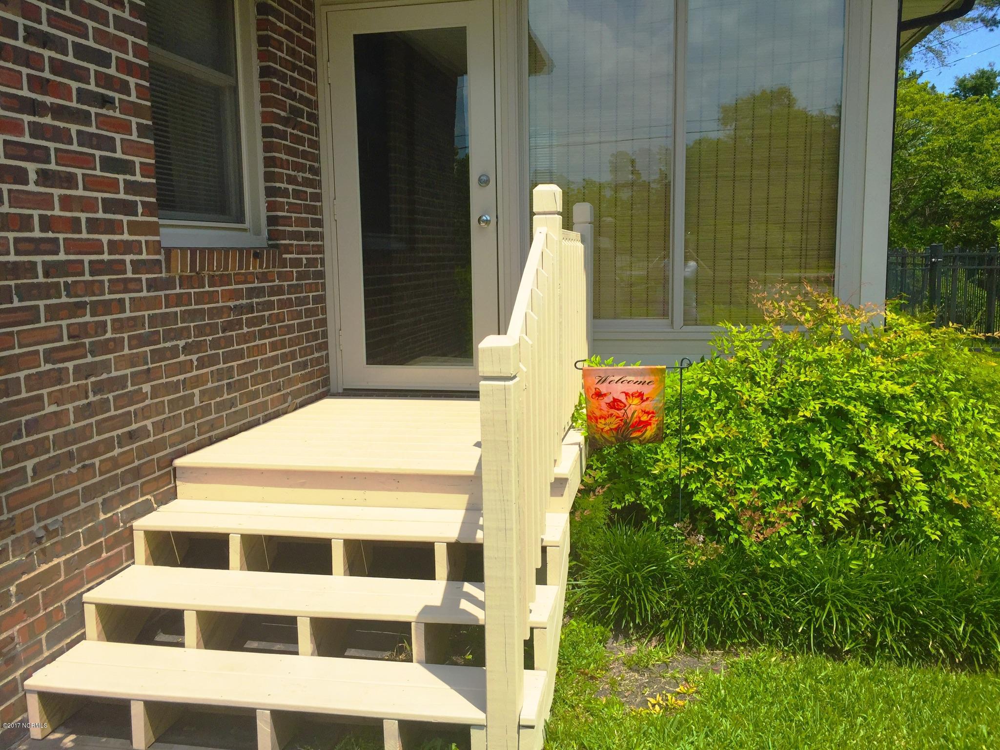 3937 Halifax Road Wilmington, NC 28403 - Photo 14 of 50 Side entrance into sunroom