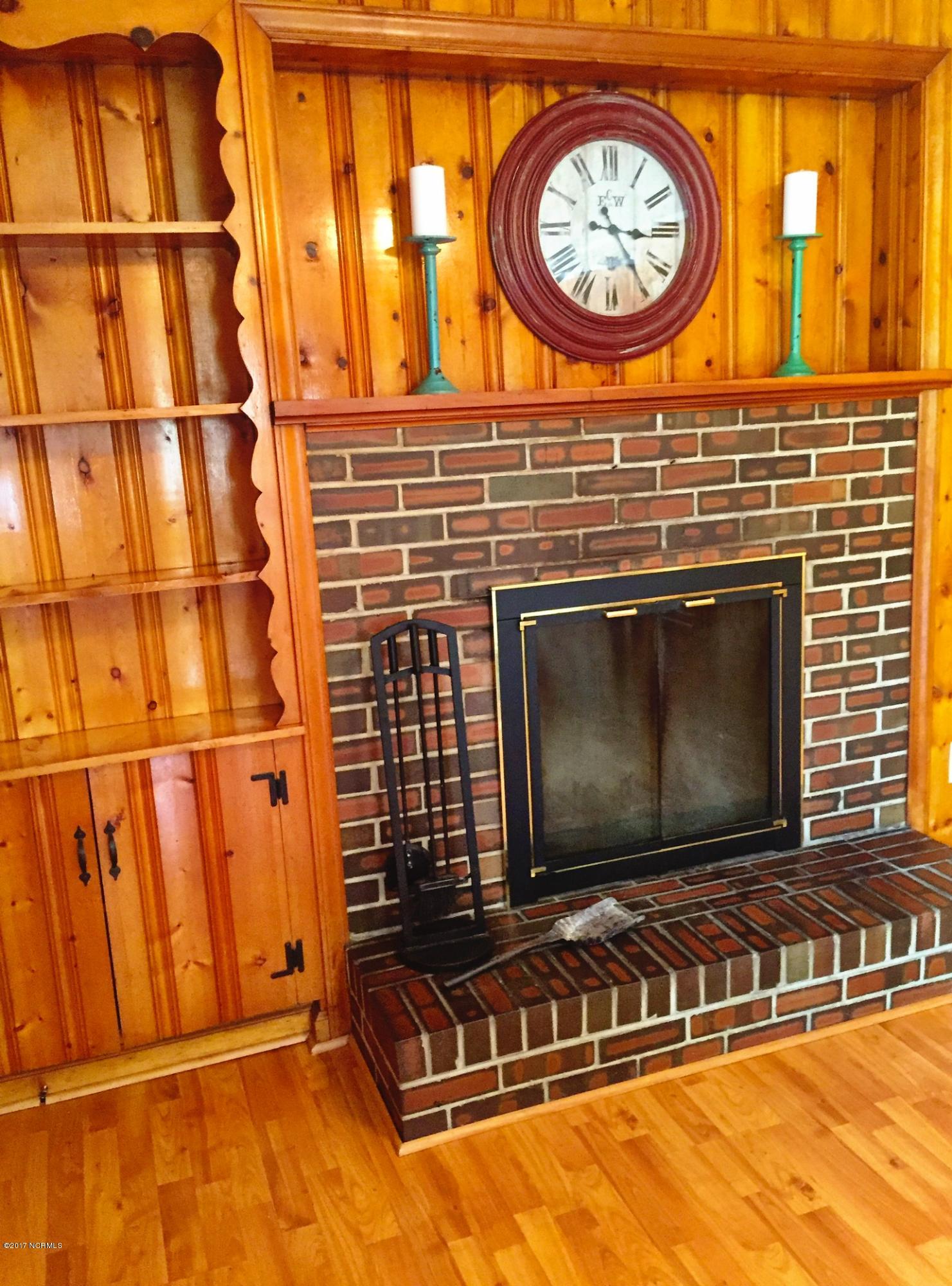 3937 Halifax Road Wilmington, NC 28403 - Photo 20 of 50 Fireplace with built-in shelving