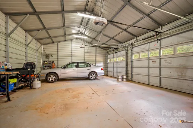 a view of parking garage with cars