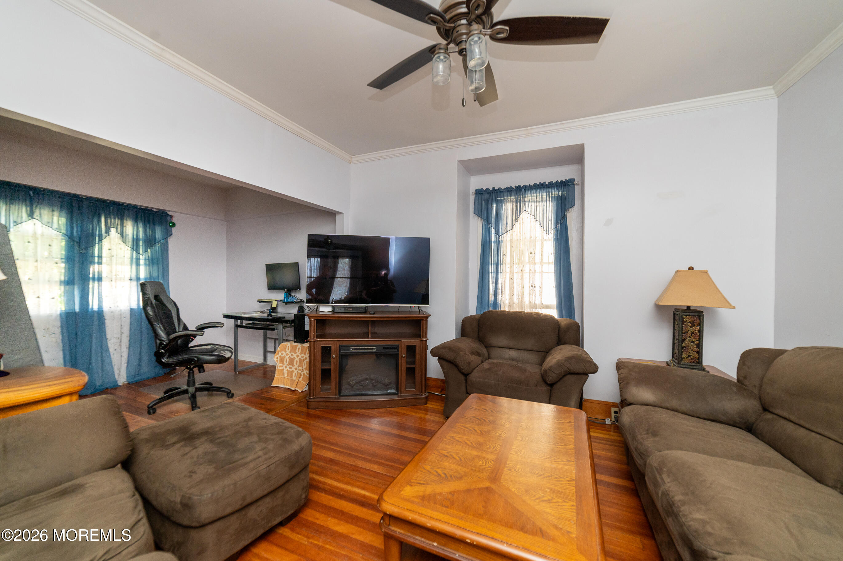 38 Walnut Street Keyport, NJ 07735 - Photo 12 of 19 a living room with furniture and a flat screen tv