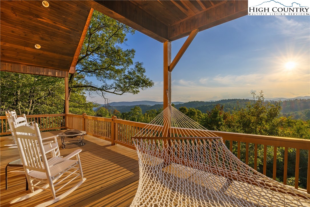 4923 Staghorn Road Purlear, NC 28665 - Photo 11 of 49 a view of balcony with wooden floor and seating space
