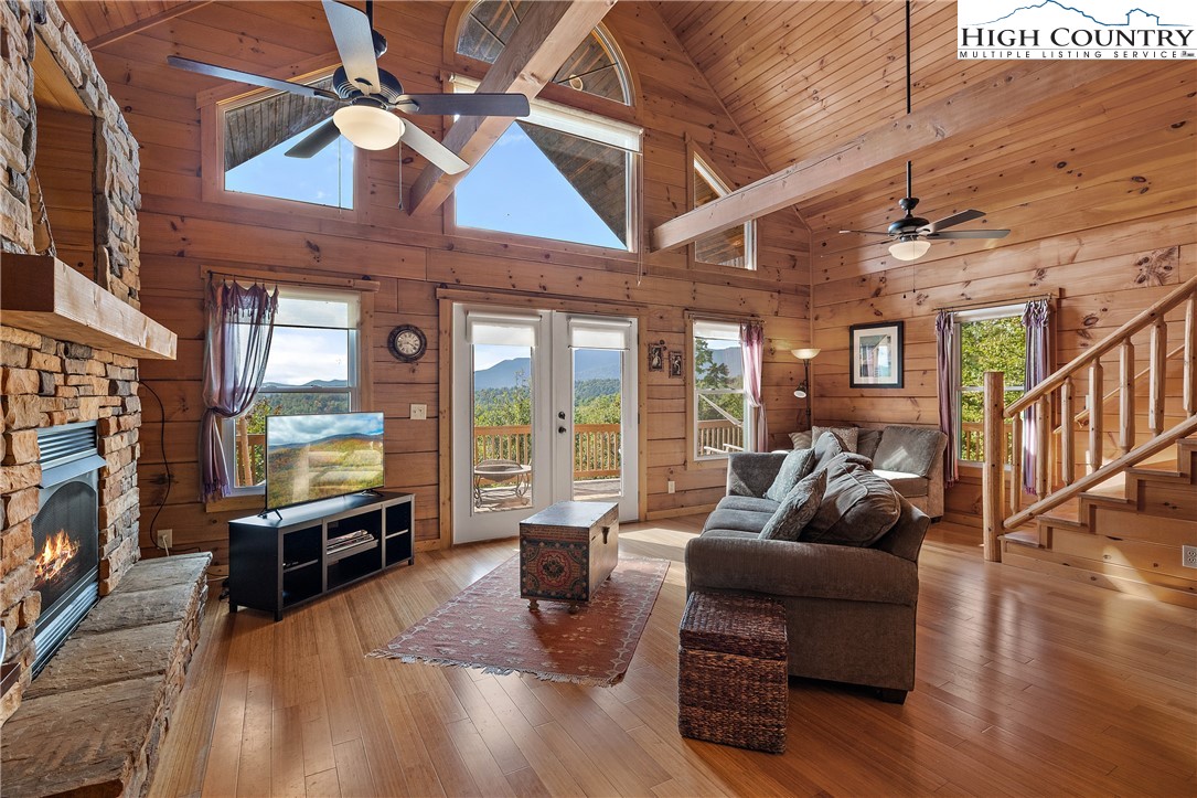 4923 Staghorn Road Purlear, NC 28665 - Photo 15 of 49 a living room with furniture and a fireplace
