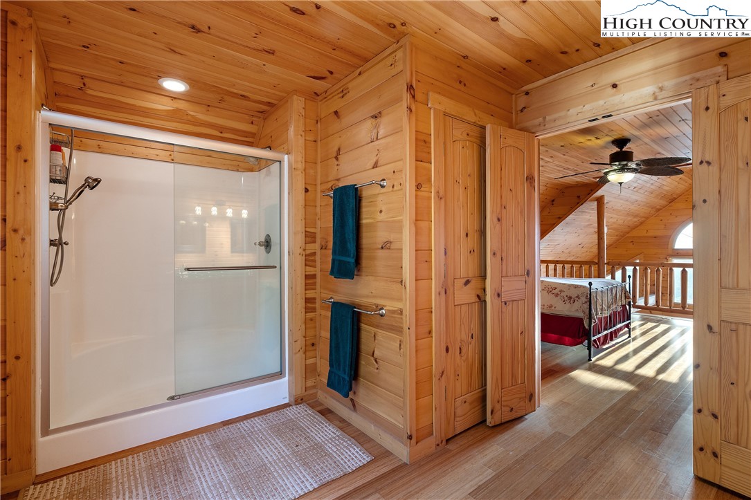 4923 Staghorn Road Purlear, NC 28665 - Photo 26 of 49 a view of a hallway with wooden floor and closet