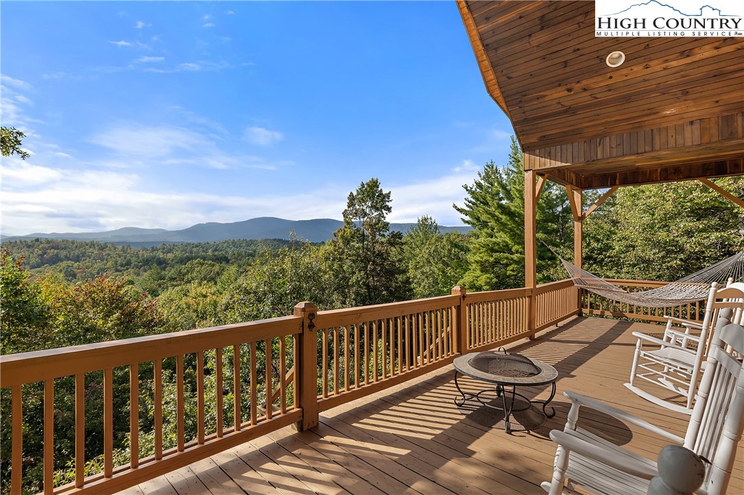 4923 Staghorn Road Purlear, NC 28665 - Photo 3 of 49 a view of a two chairs in the balcony