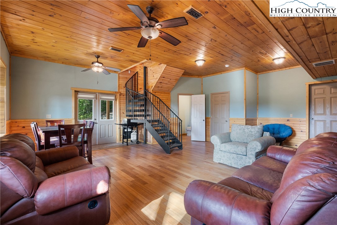 4923 Staghorn Road Purlear, NC 28665 - Photo 35 of 49 a living room with furniture and wooden floor