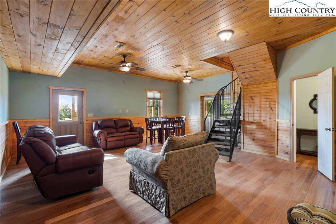 4923 Staghorn Road Purlear, NC 28665 - Photo 37 of 49 a living room with furniture and wooden floor