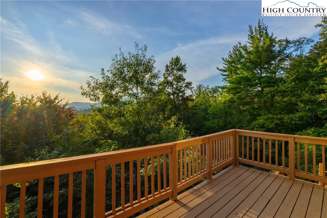 4923 Staghorn Road Purlear, NC 28665 - Photo 39 of 49 a view of balcony with wooden floor and fence