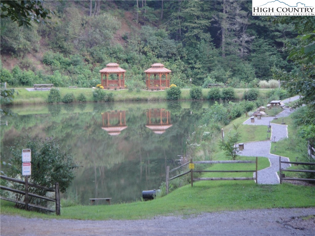 4923 Staghorn Road Purlear, NC 28665 - Photo 49 of 49 a view of a bench in front of house