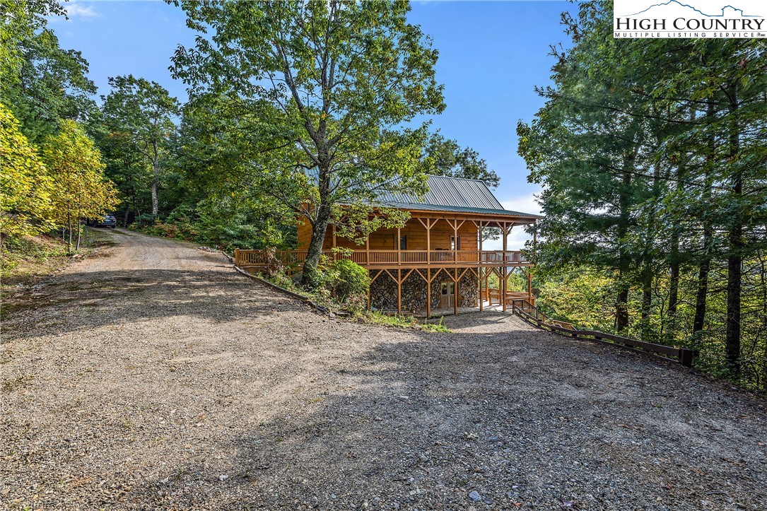 4923 Staghorn Road Purlear, NC 28665 - Photo 7 of 49 a view of house with outdoor space