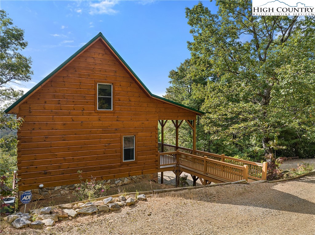 4923 Staghorn Road Purlear, NC 28665 - Photo 8 of 49 a view of a house with a yard