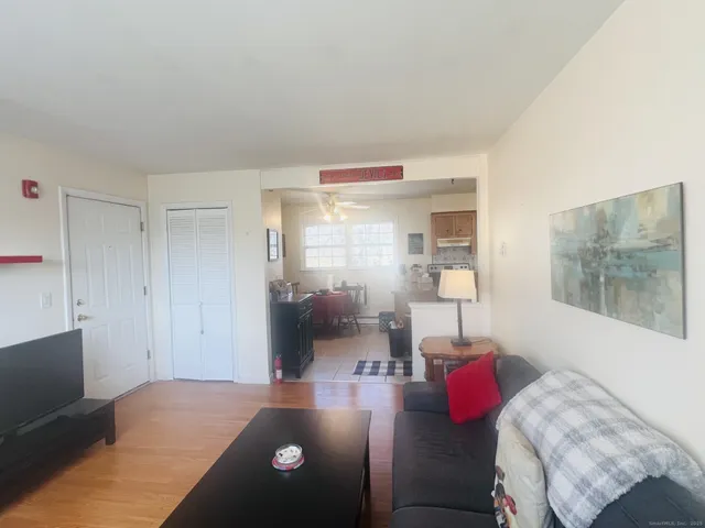 a living room with furniture and a window