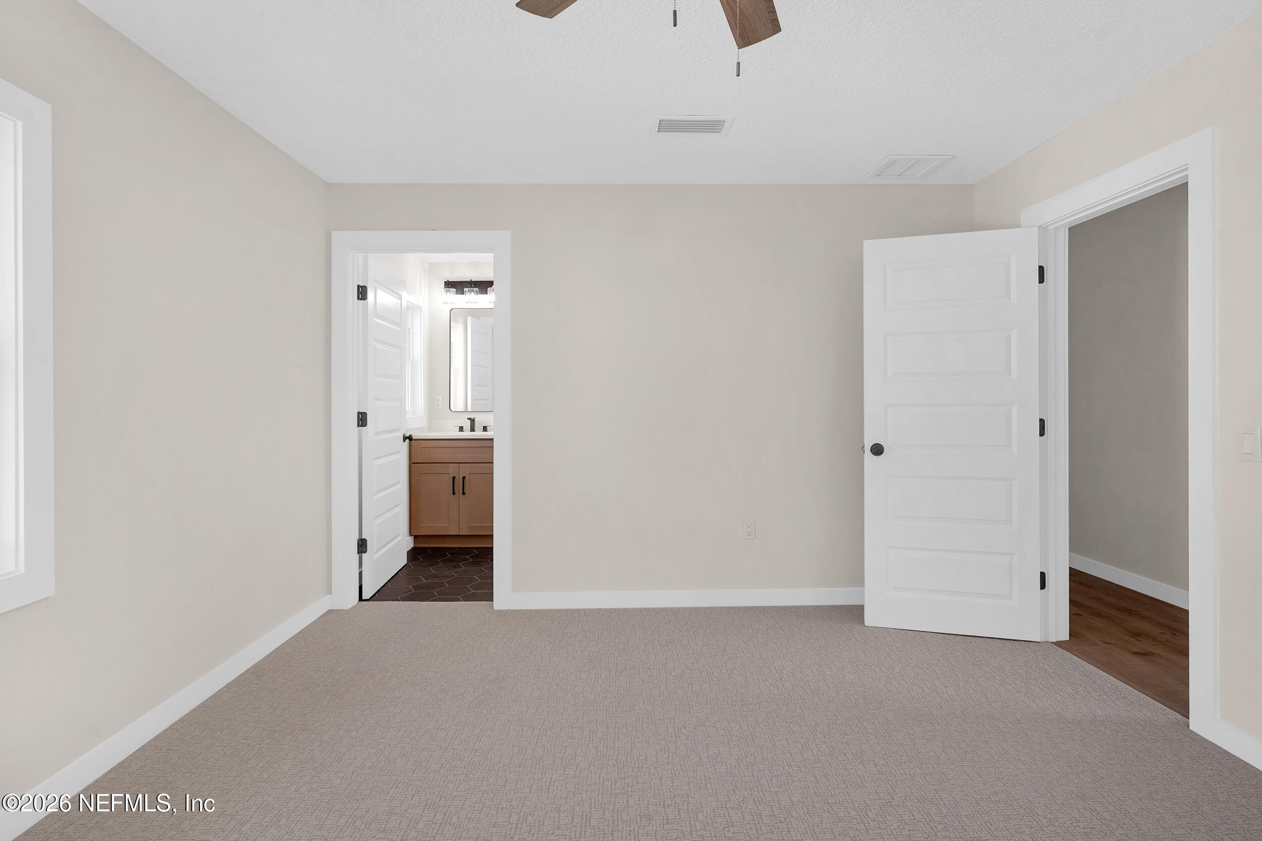1132 5th Street St. Augustine, FL 32095 - Photo 20 of 34 a view of a room with a hallway and closet